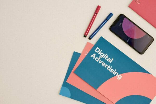 digital marketing agency vietnam-brochure-pens-and-mobile-phone