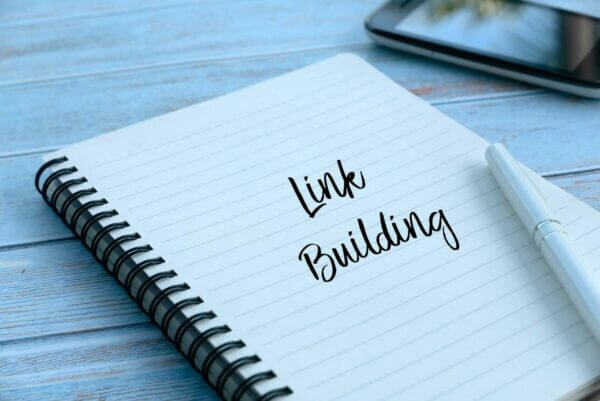 offpage-seo-services-Link building-and-citations-wrote-in-black-pen-on-white-lined-paper