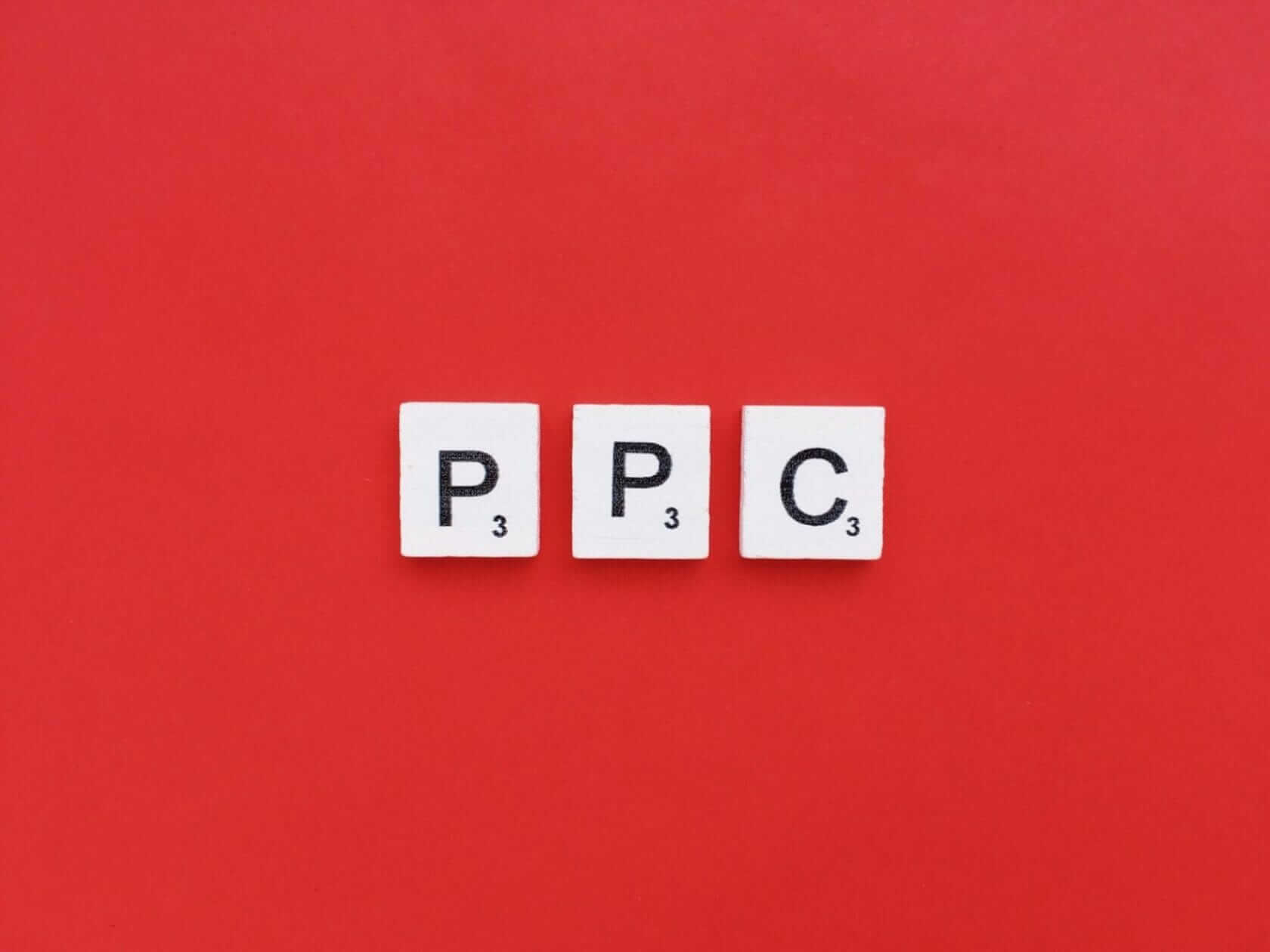 Pay Per Click advertising-PPC scrabble letters word on a red background