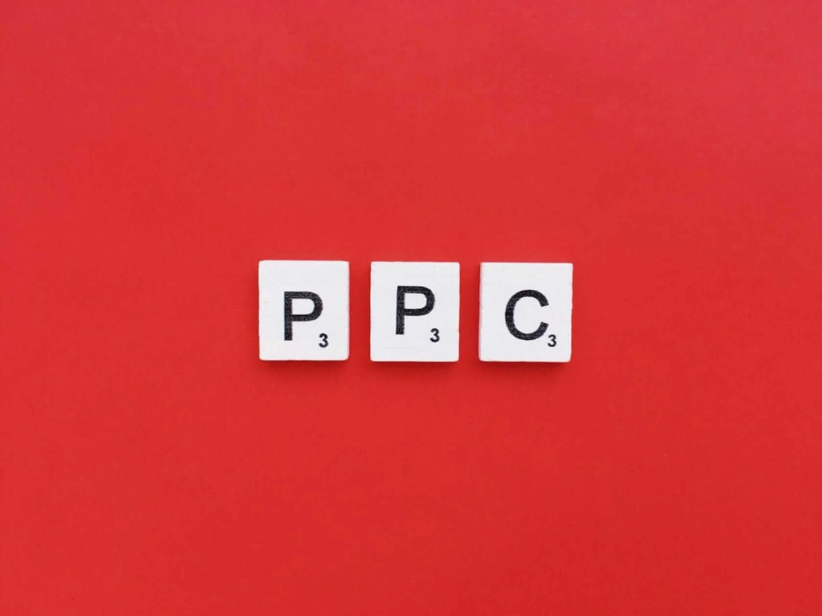 Pay Per Click advertising-PPC scrabble letters word on a red background