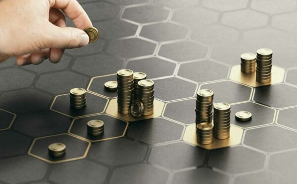 Treat-your-real-estate-web-design-like-an-investment-showing-towers of coins
