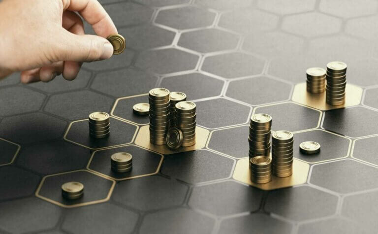 Treat-your-real-estate-web-design-like-an-investment-showing-towers of coins