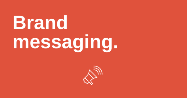 brand messaging in white writing on a red background with a megaphone