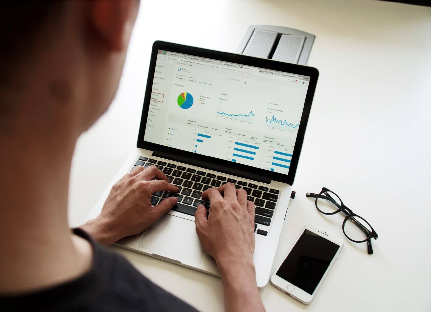 our SEO specialist performing Website SEO Audit services on his computer.