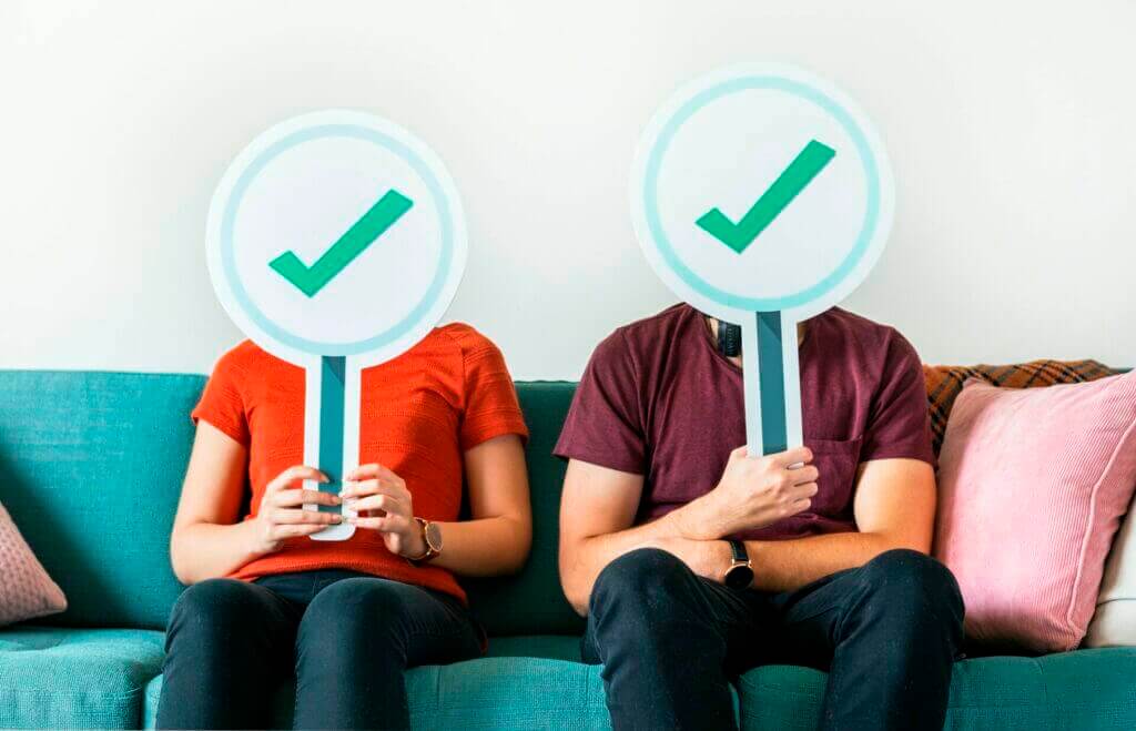 Couple showing yes sign icon to digital marketing