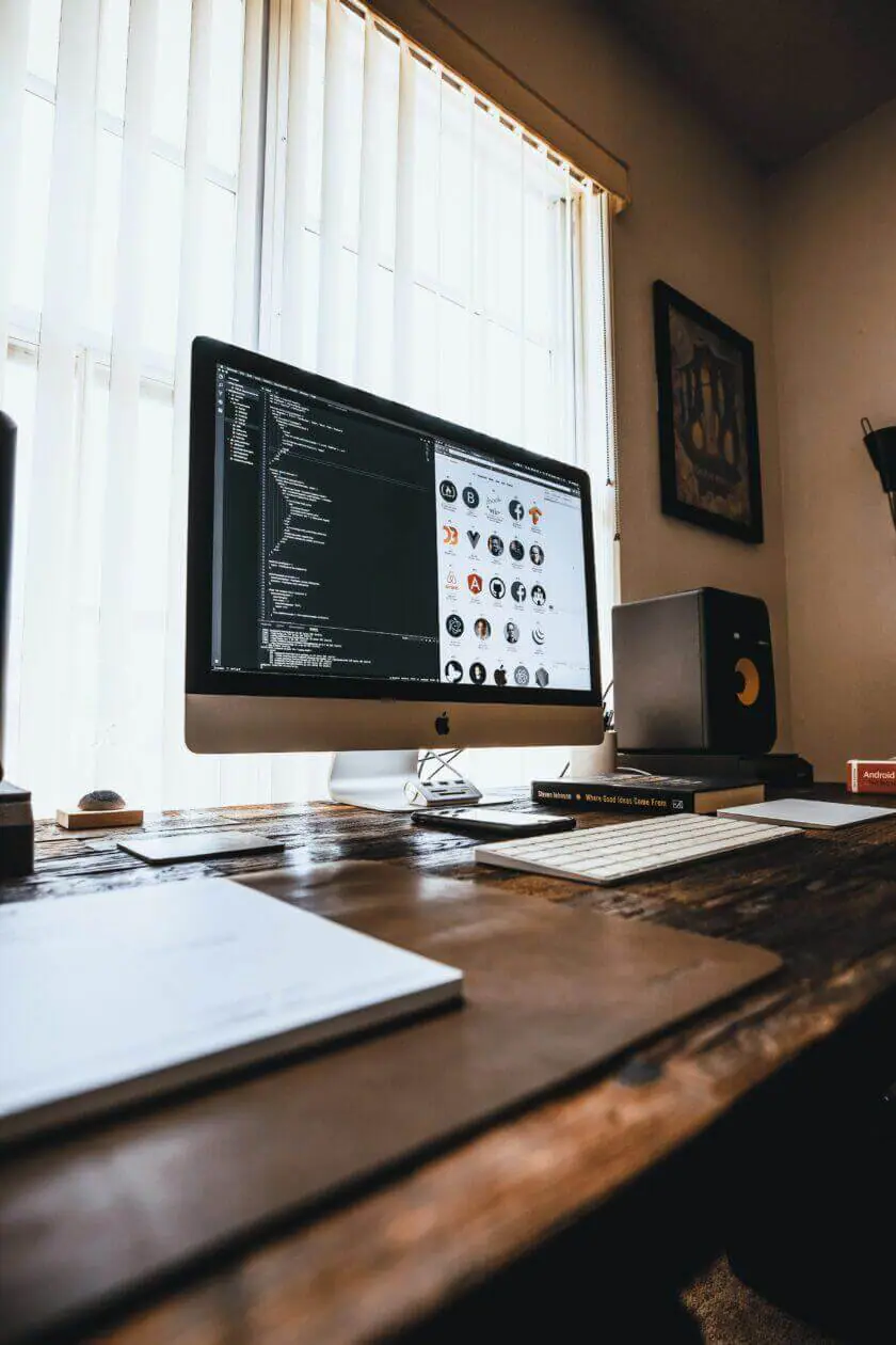 A computer screen showing web development on one side and web design on the other.