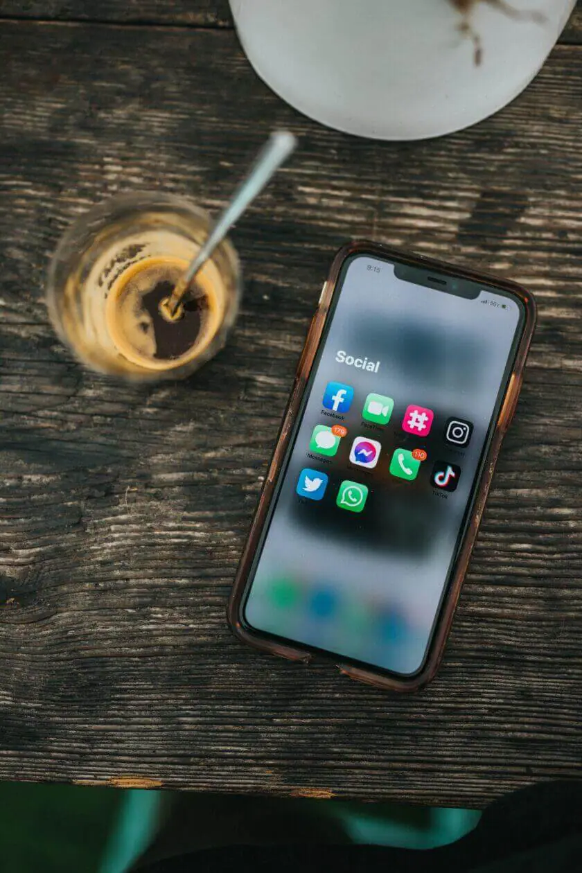 a mobile phone showing some of the most popular apps for social media marketing services