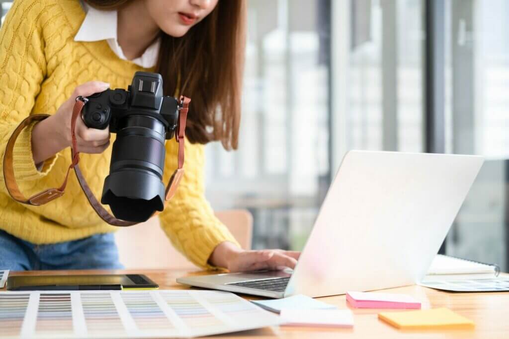 Young Asian Brand Designer Working on Computer.