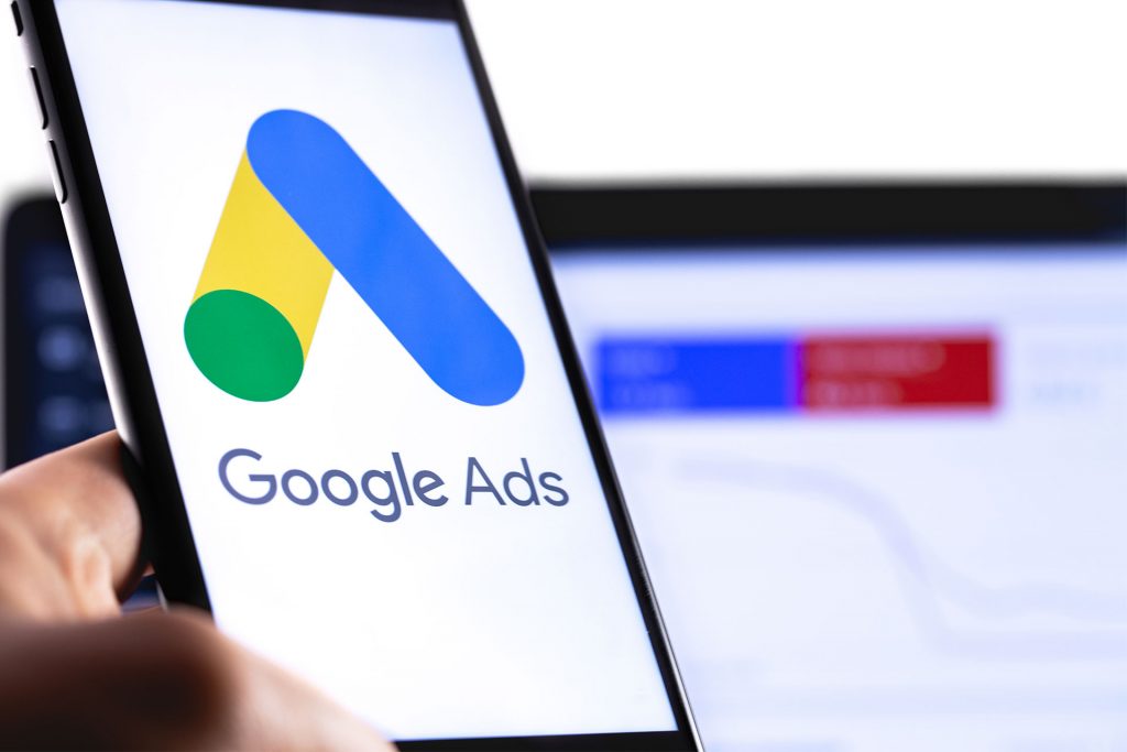 what are PPC services mobile phone with Google Ads logo